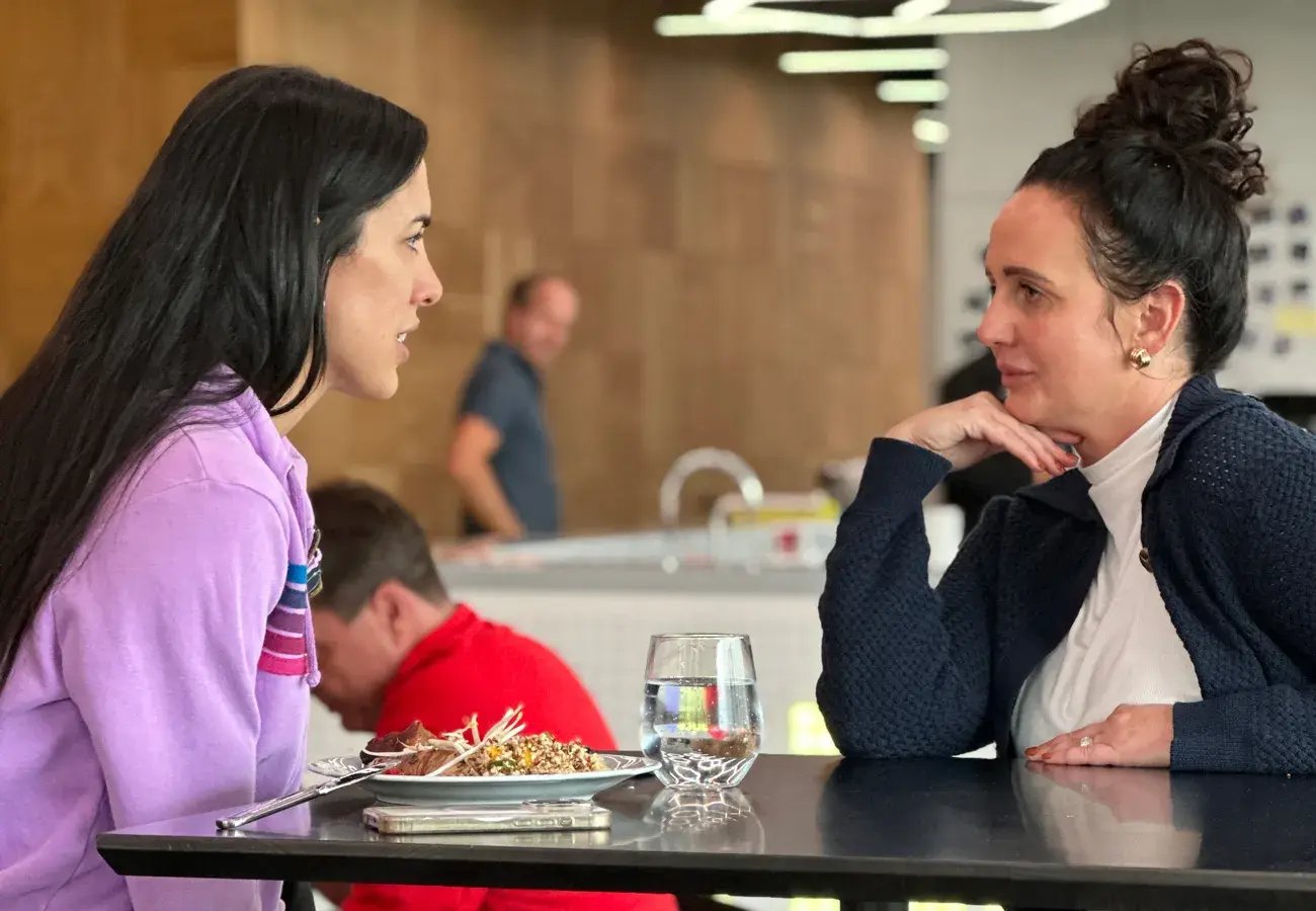 Two Pricefx employees sharing ideas over lunch in the Prague office