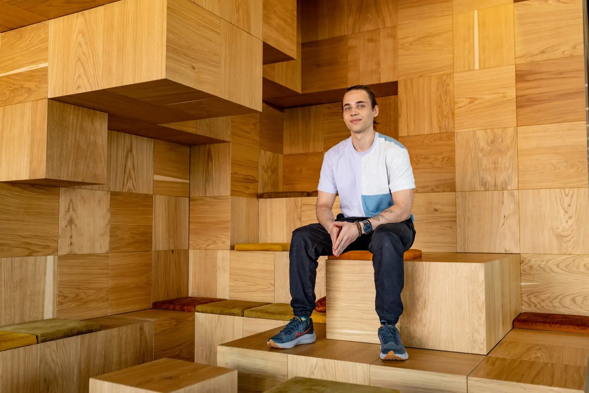 Donatas Kartanovicius sitting at office