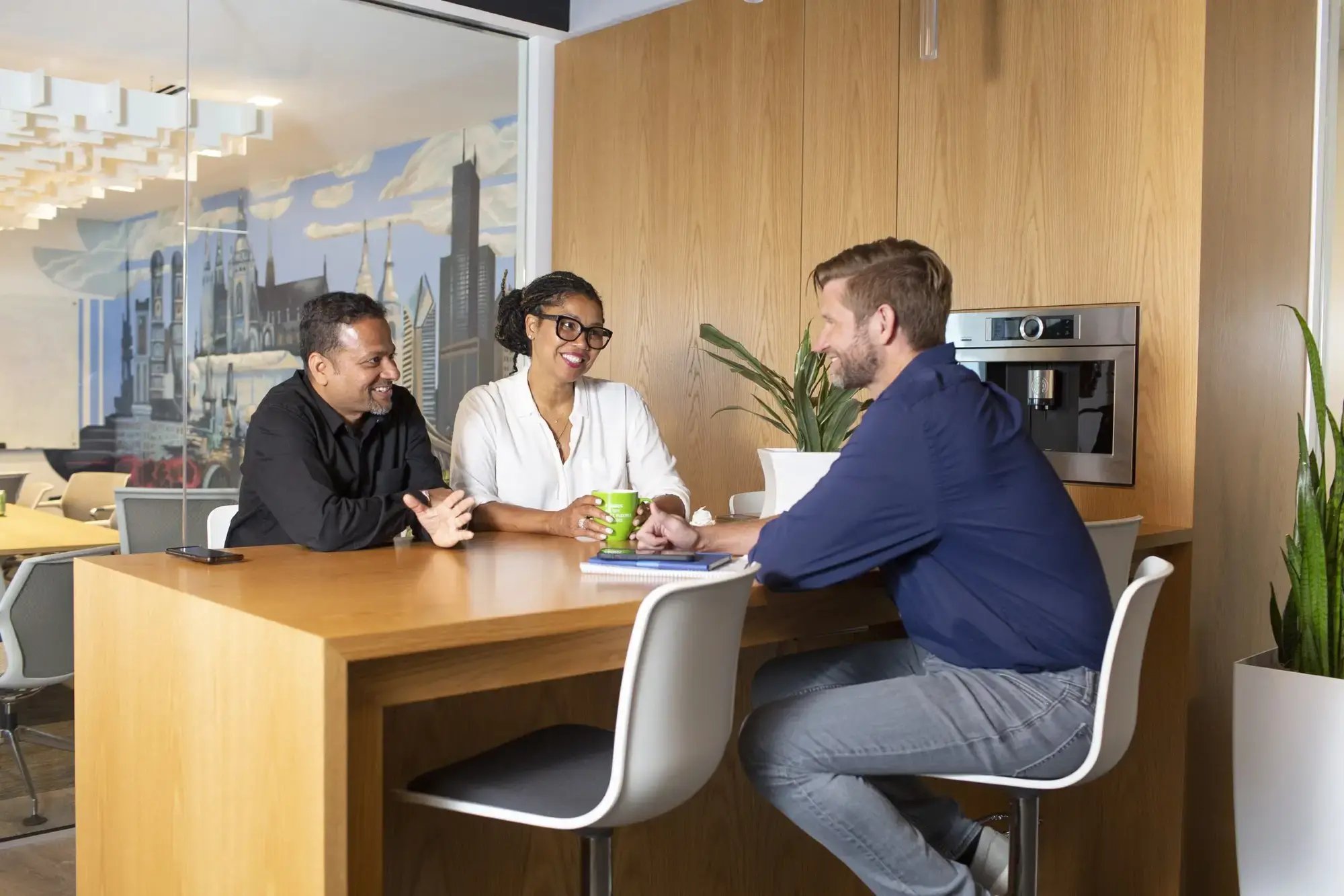 Pricefx employees meeting in the Chicago office