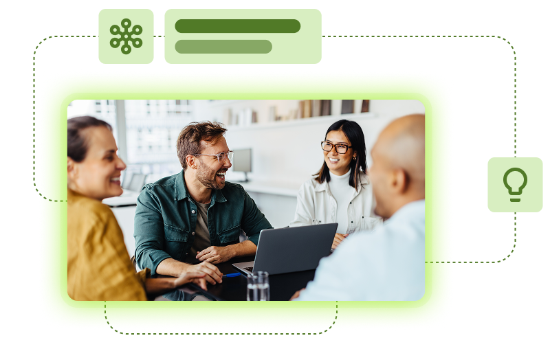 Team collaborating around a laptop with icons for ideas and connected workflows