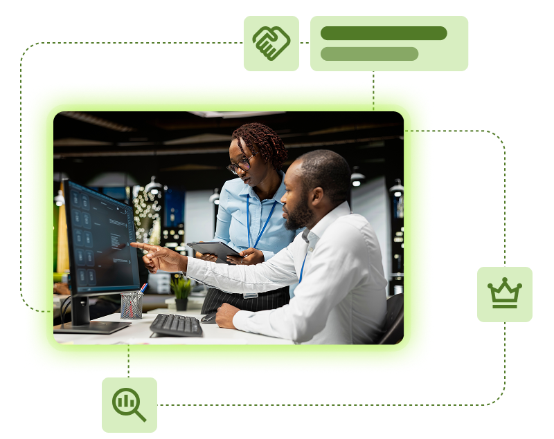 Two colleagues reviewing on-screen data with icons for partnership, analysis, and performance