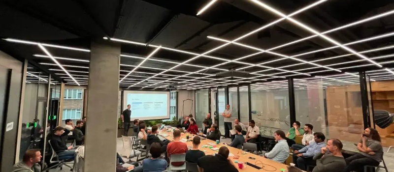 Pricefx engineers in training at the office large meeting room for presentation