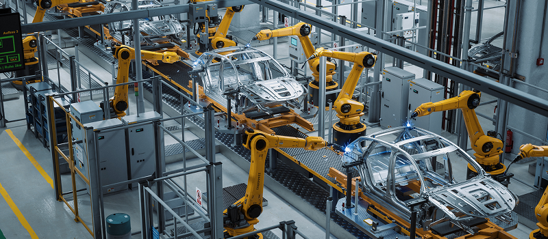 Robotic arms weld car bodies on an automotive assembly line-2