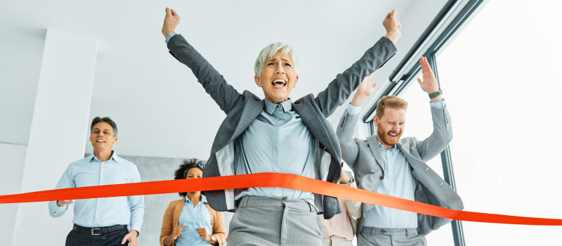 Team celebrates ribbon-cutting at a new office opening1