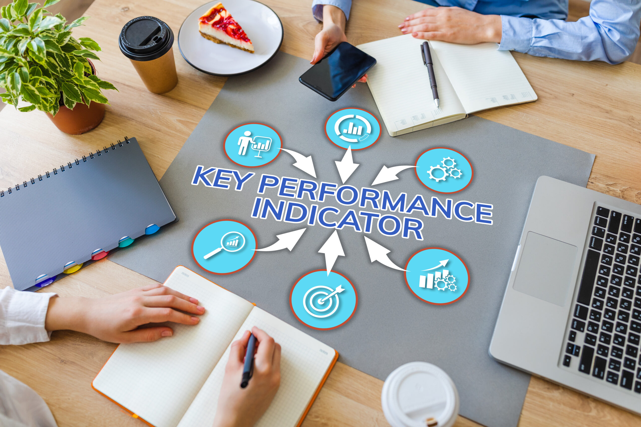 Key-Performance-Indicator-Factors-Laid-Out-On-Staff-Meeting-des