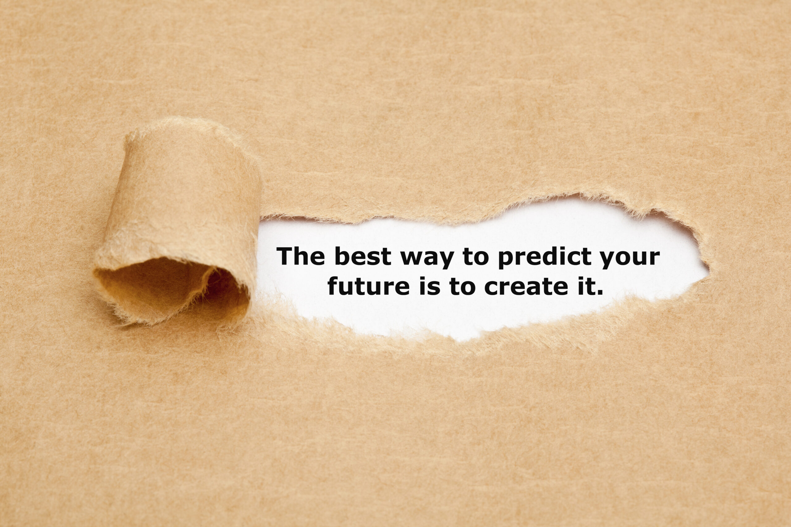 The-best-way-to-predict-your-future-is-to-create-it-torn-paper