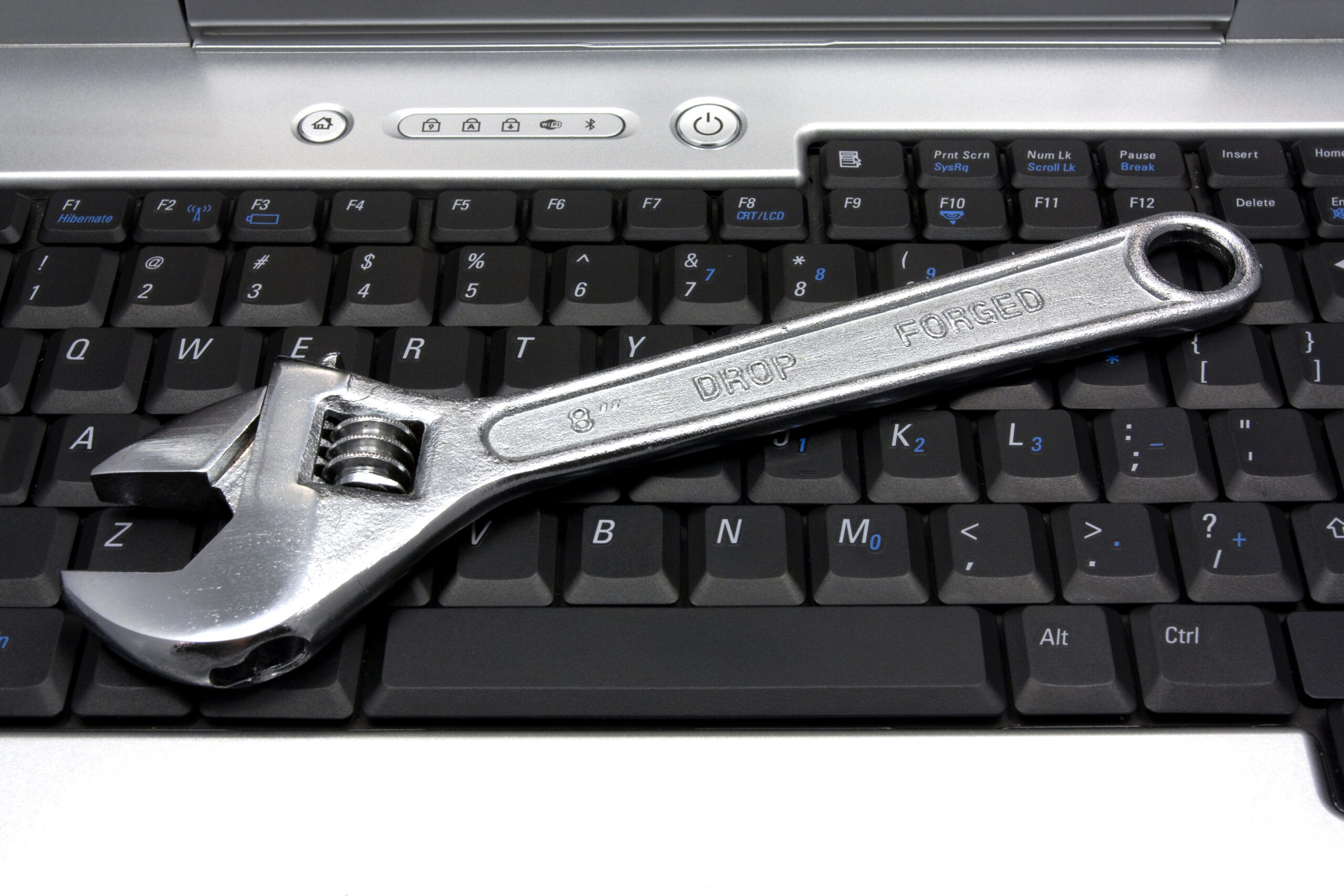 Adjustable-Wrench-Sitting-on-Laptop-Keyboard