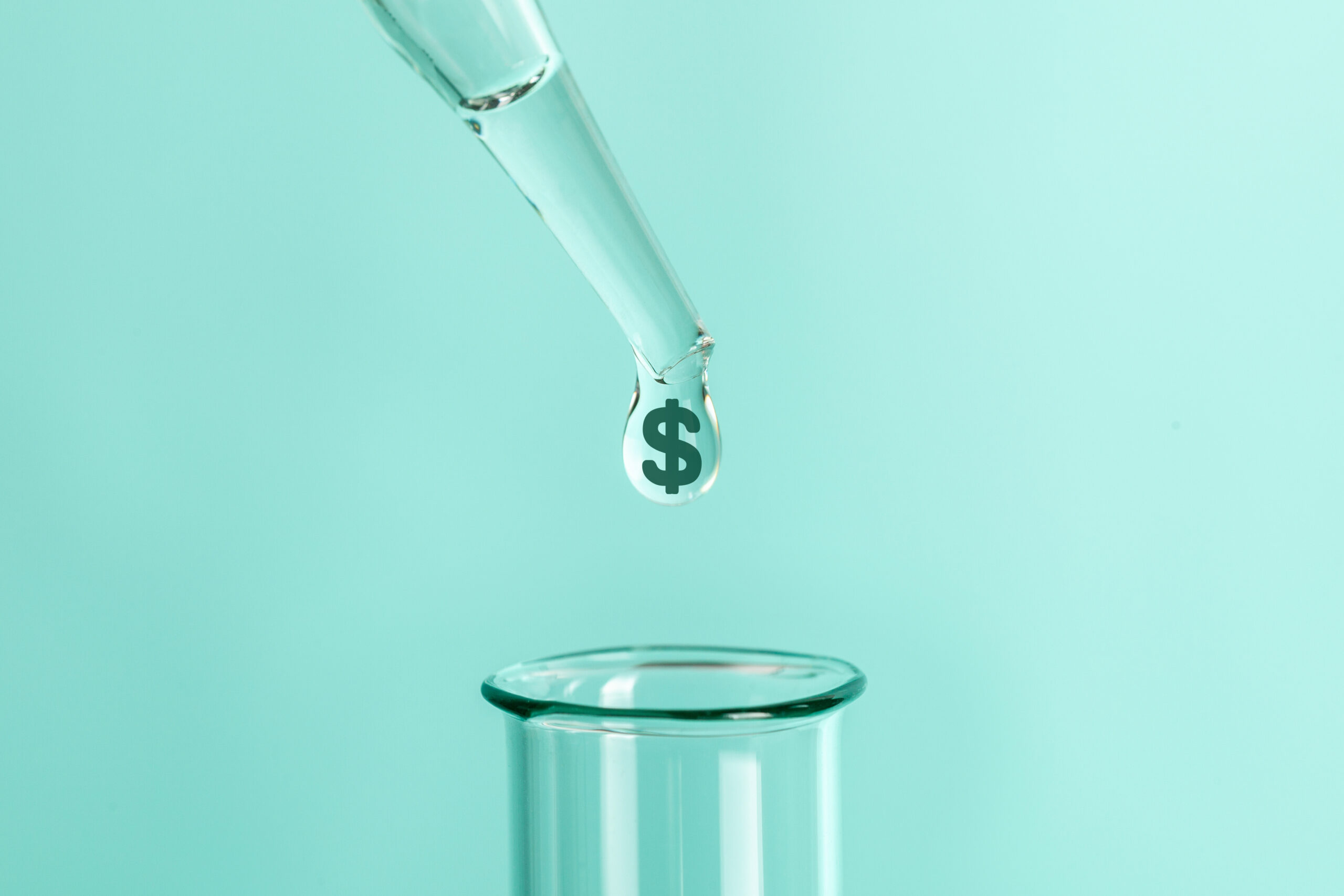 Green-Dollar-Sign-Drops-From-Pipette-to-Test-Tube